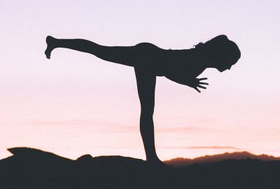 Silhouette of a person doing a yoga pose